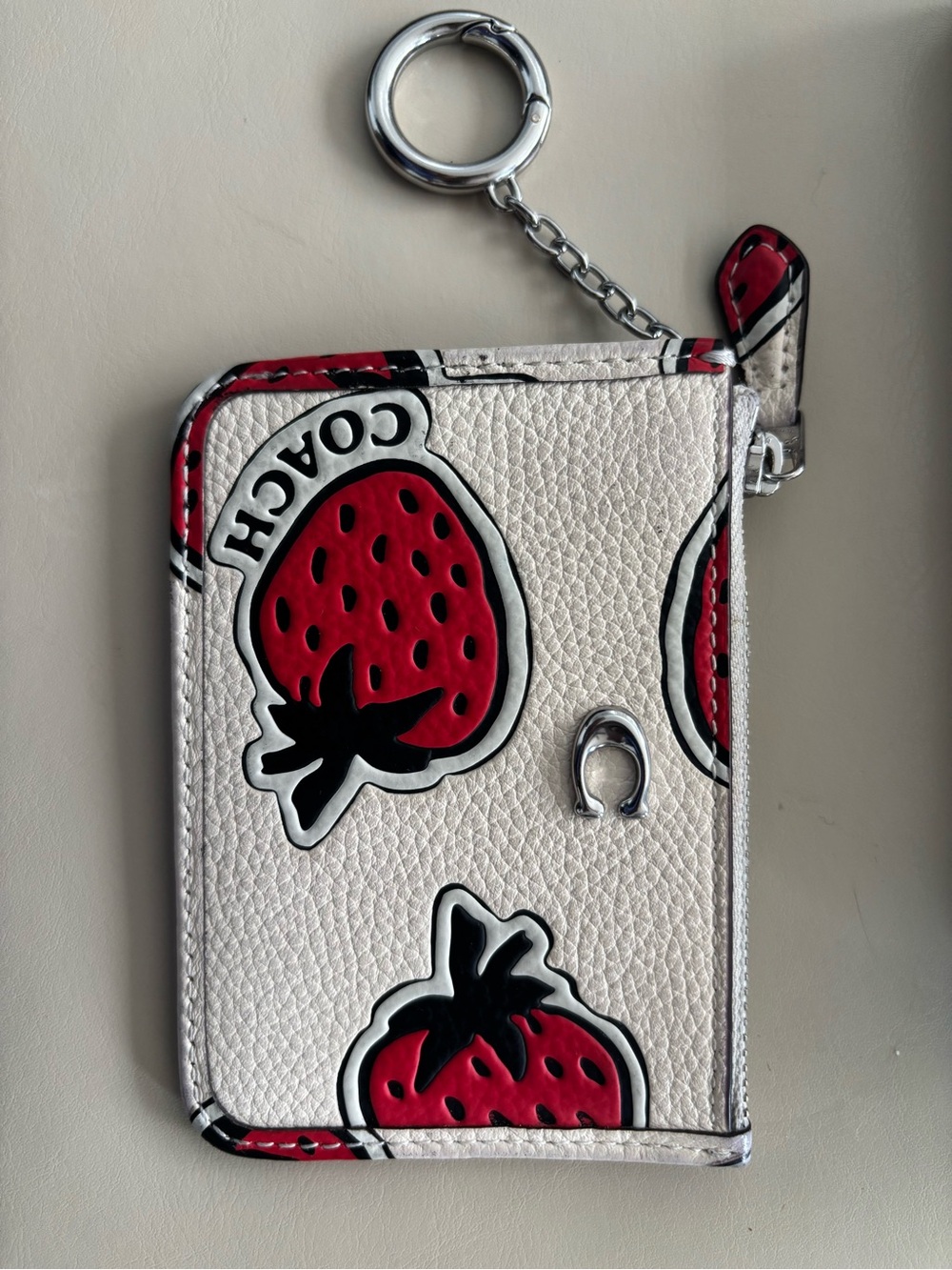 Coach Leather Pouch with Red Strawberry Keychain.